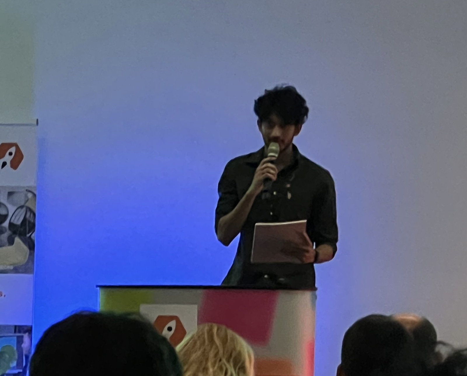 Aditya pitching on stage at Campus Startup Night 2024